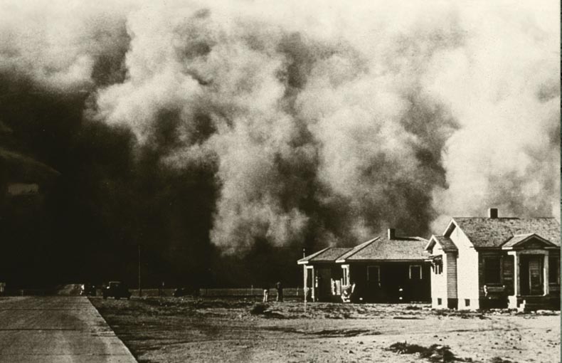 Vintage photograph of Oklahoma field and houses during a massive dust storm