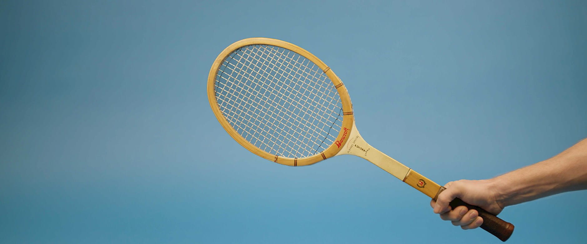 Tennis racket in hand