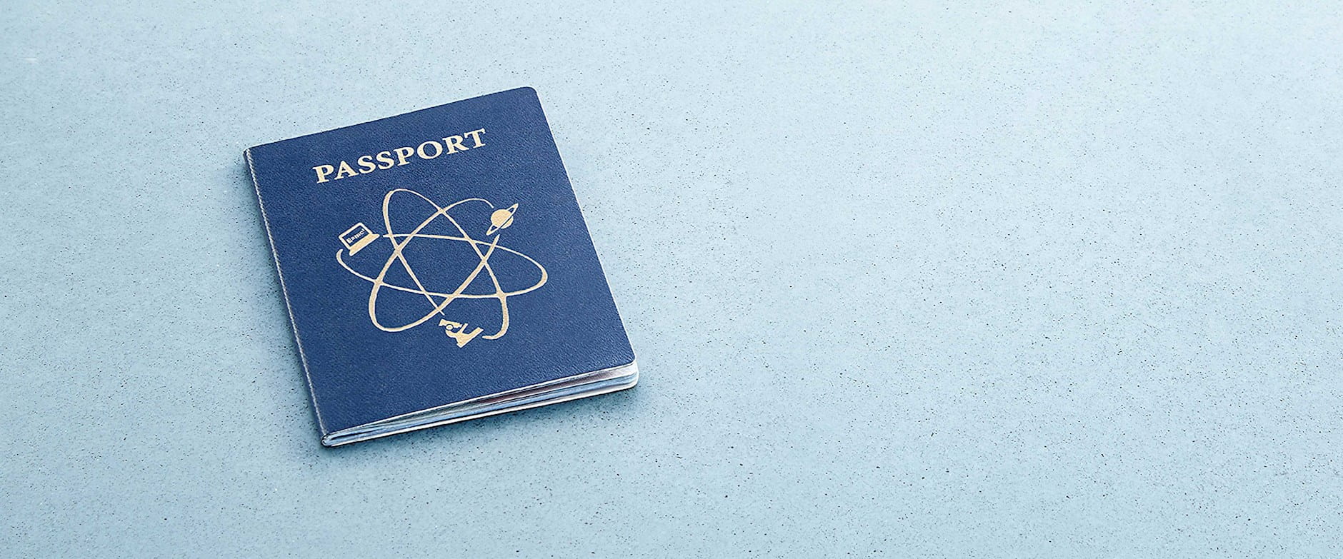 Passport with work-related symbols like a microscope and computer on it
