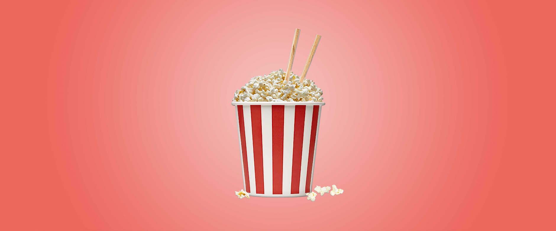 Popcorn in bucket with chopsticks