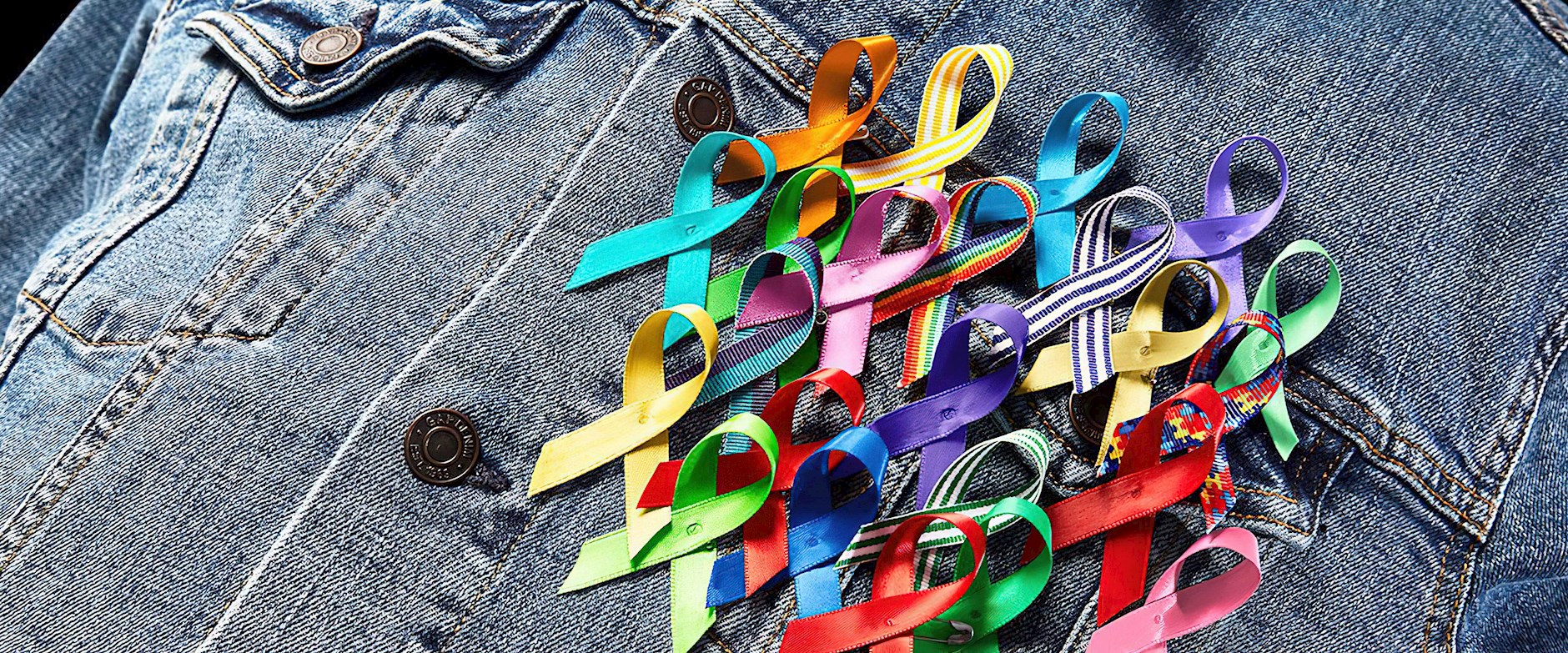 Jean jacket covered in awareness ribbons