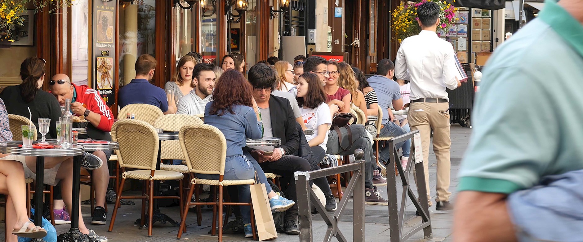 People dining at an outdoor restaurant