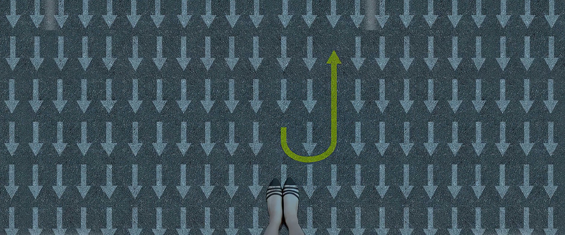 High-heeled shoes at the bottom over a field of downward-facing arrows; a single green arrow points up